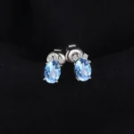 Sky Blue Topaz Oval Stud Earrings in Silver - Image 2